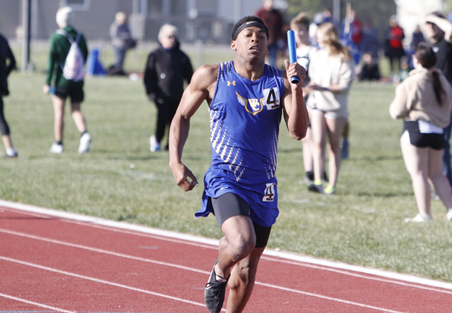 Wright City senior Jeremiah Davis completes the last leg of 
the relay during Tuesday’s EMO conference meet at Wright 
City High School.