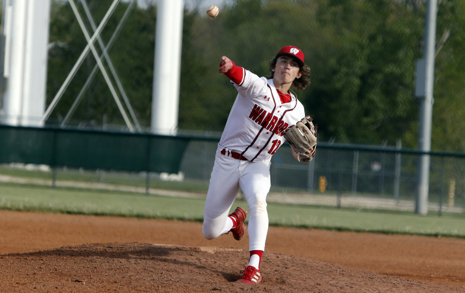 Warrenton senior Kannon Hibbs delivers a pitch to home plate during the fifth inning of last week's game.