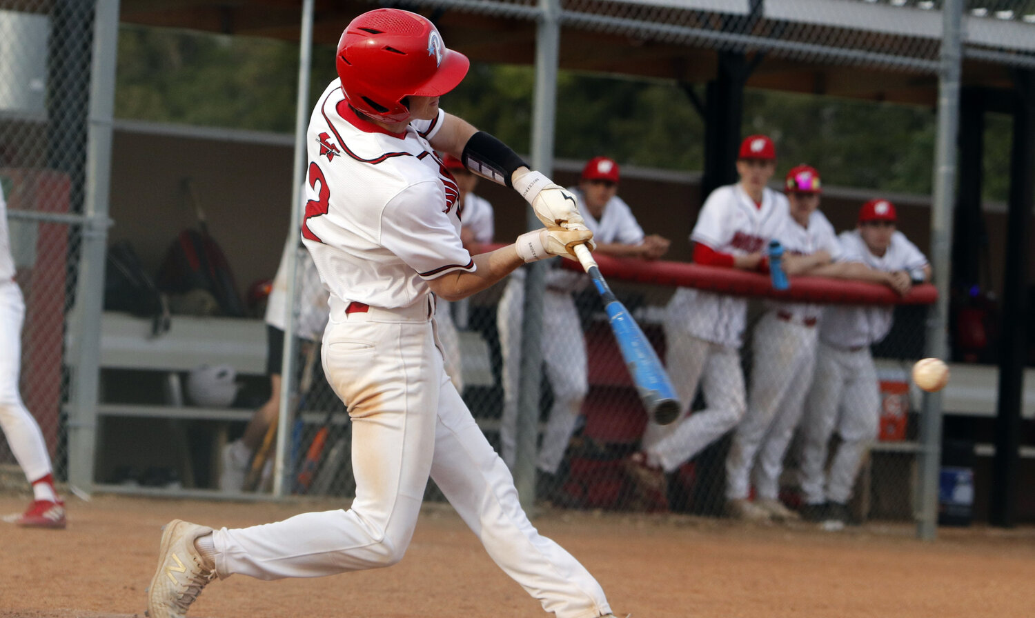 Caleb Clark swings at a pitch during the seventh inning of Warrenton's loss to St. Charles West.