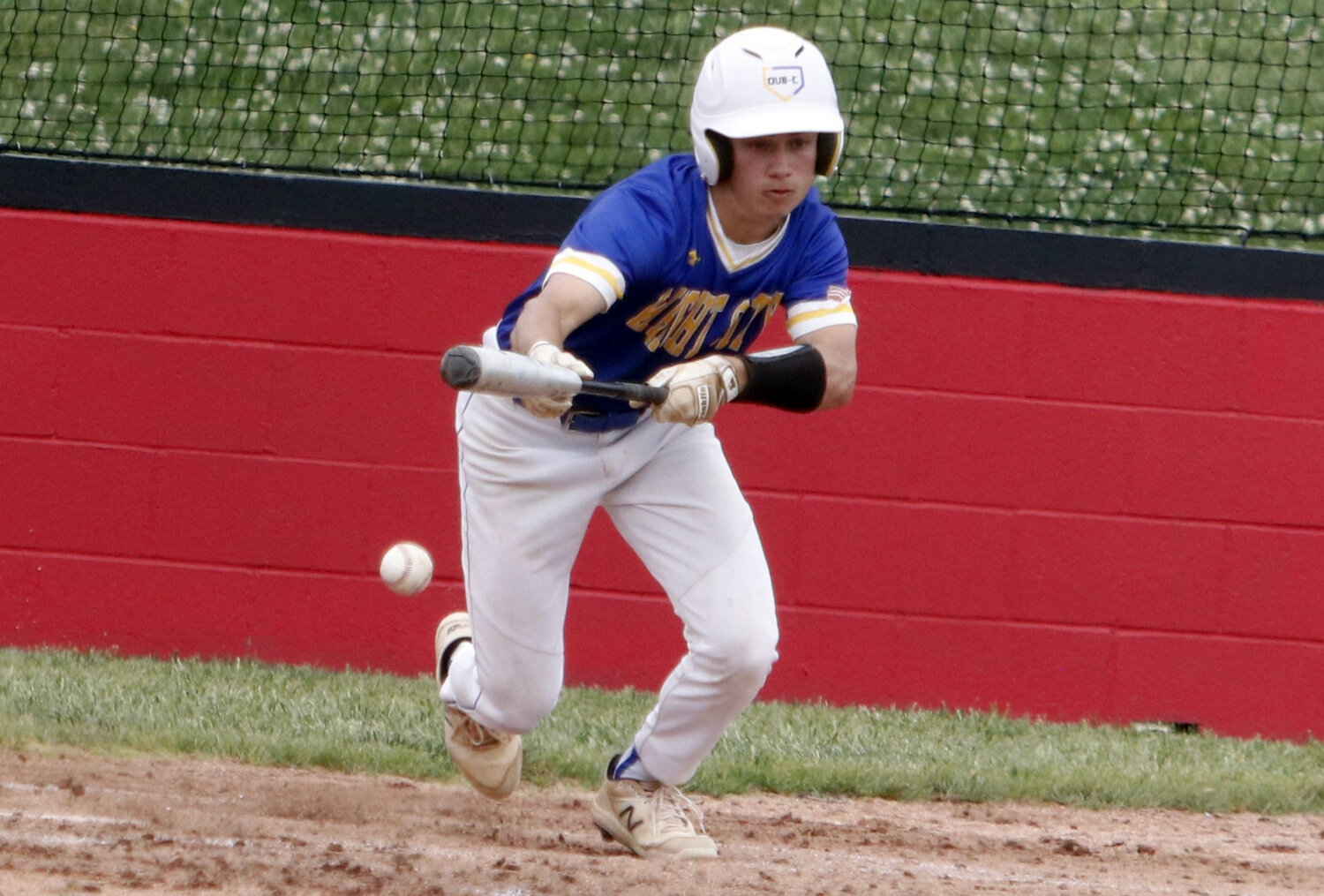 Zach Rodriguez lays down a bunt during Wright City's district semifinal loss to St. Charles West.