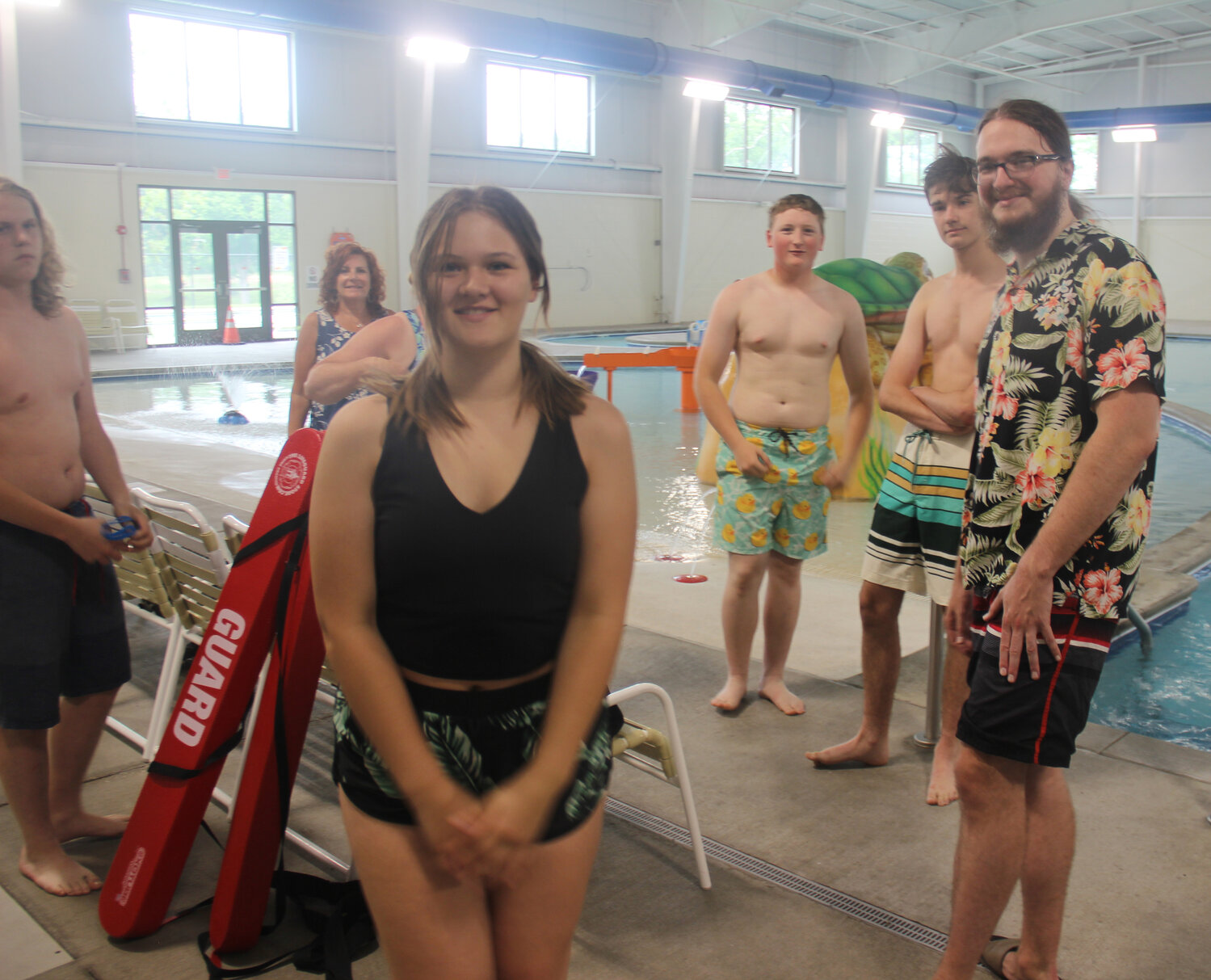 Lifeguard instructor Cole McBride, right, stands with his team of lifeguard candidates prior to the start of their May 19 training at the Warrenton Aquatic Center.