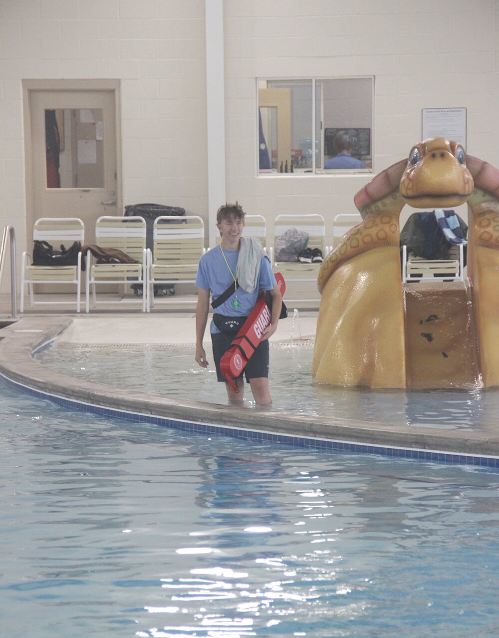 Nathanial Kutsch stands guard by the turtle slide as he watches lifeguard training on May 19.