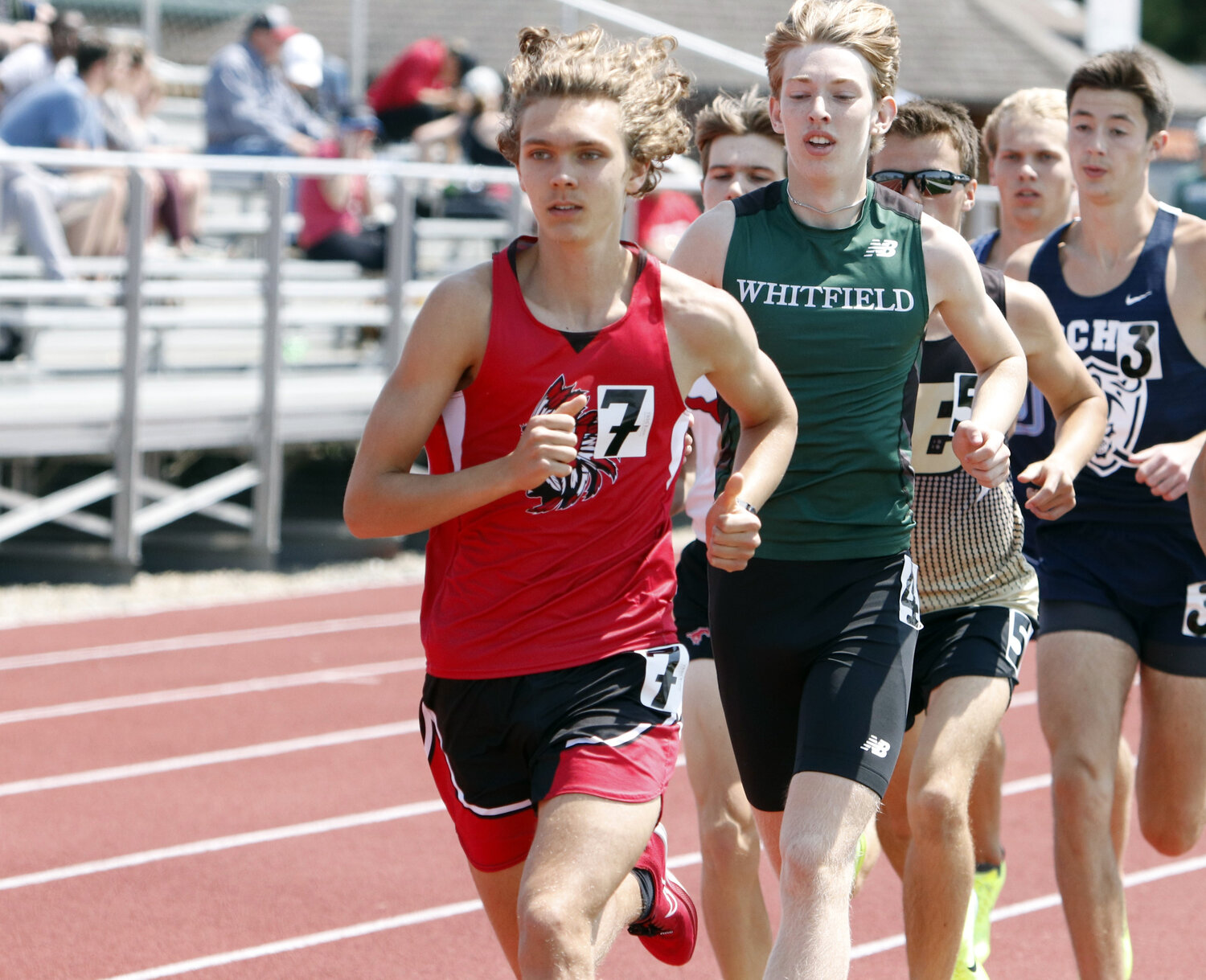 Wyatt Claiborne leads a group of runners during the 1600-meter run.