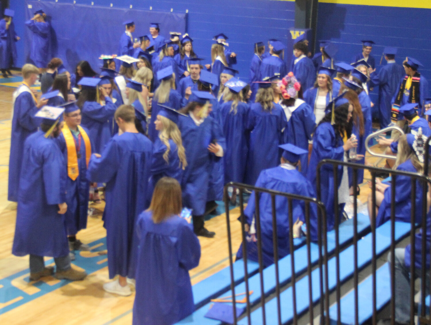 Classmates and friends mingled in the Wright City High School gym before the start of the graduation ceremony on June 2.