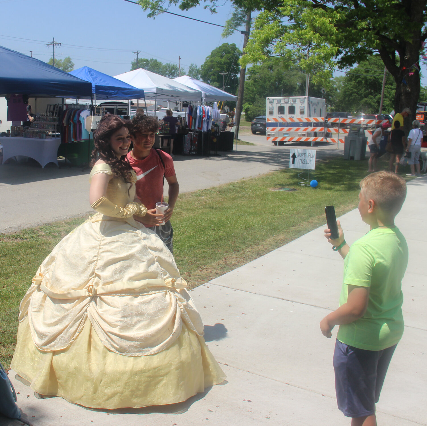 Princess Belle has her photo taken with one of the many kids who attended Summerfest on June 3 in Truesdale.