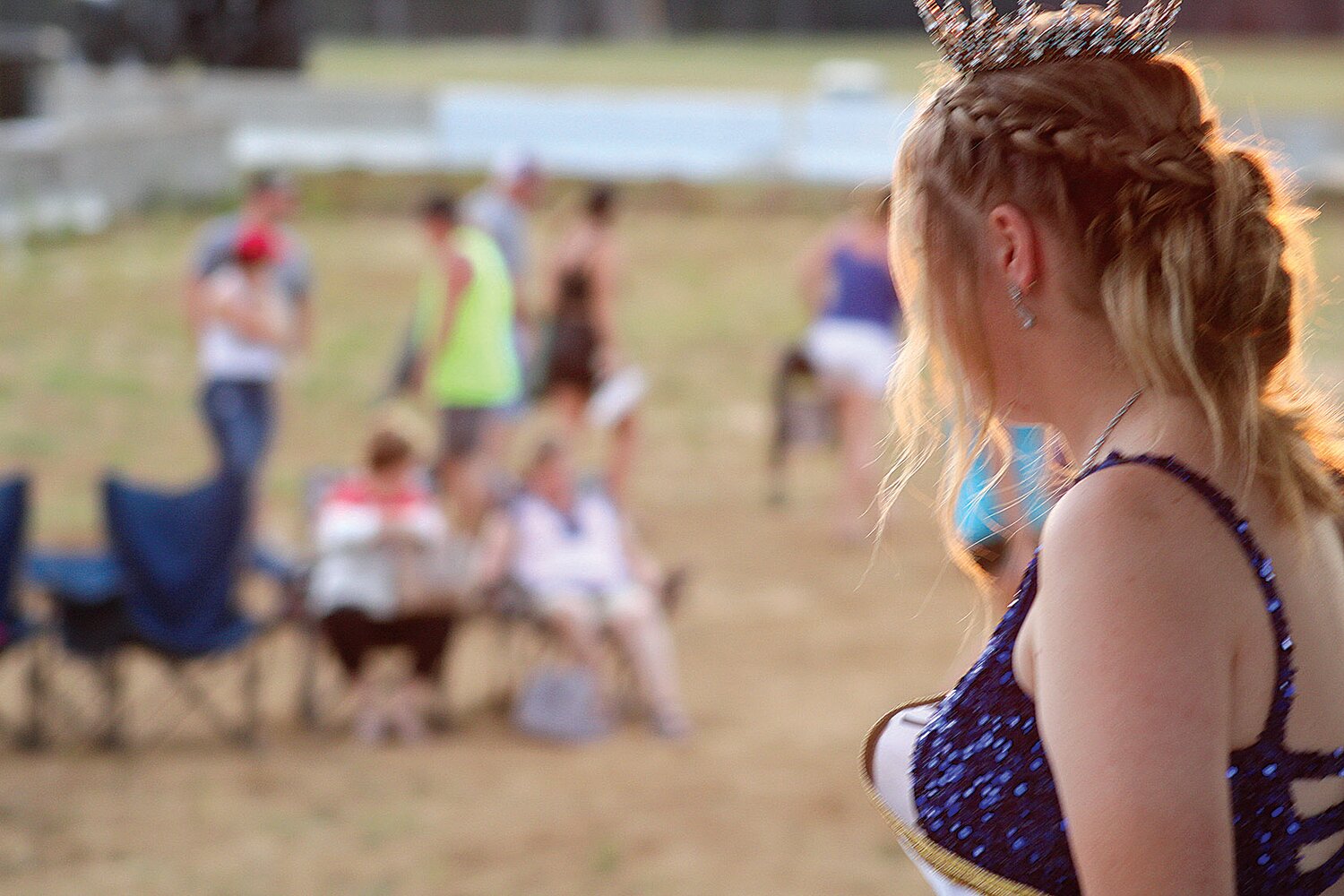 Queen Kelsey Miller surveys her new kingdom after being crowned on July 2.