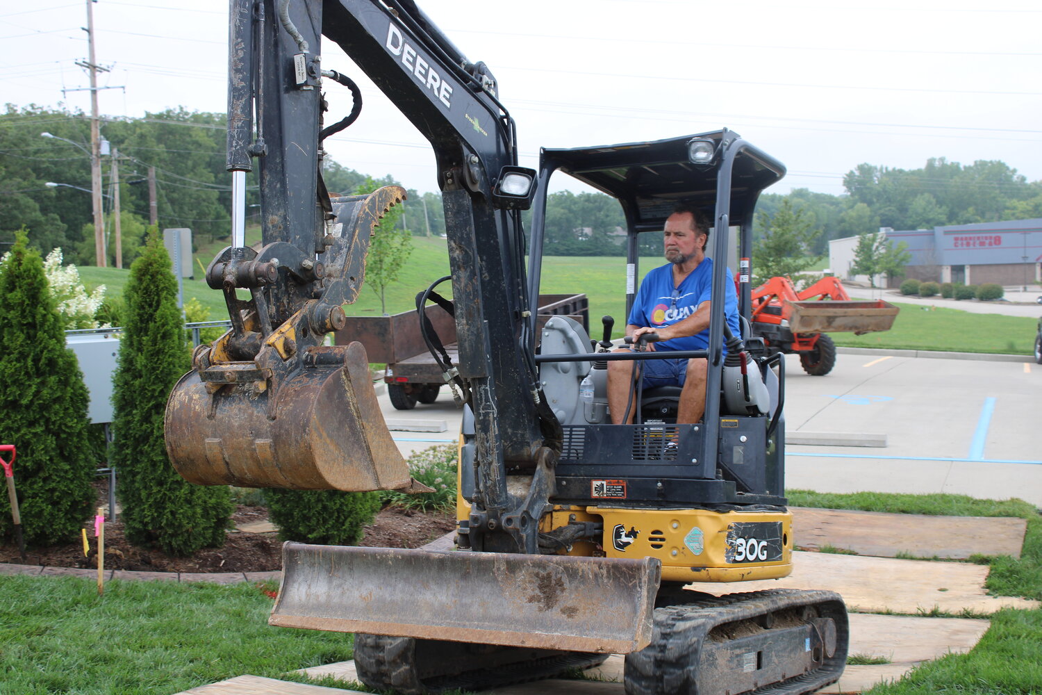 Greg Costello drives the heavy equipment that was used to prepare the site of the new Charters of Freedom.