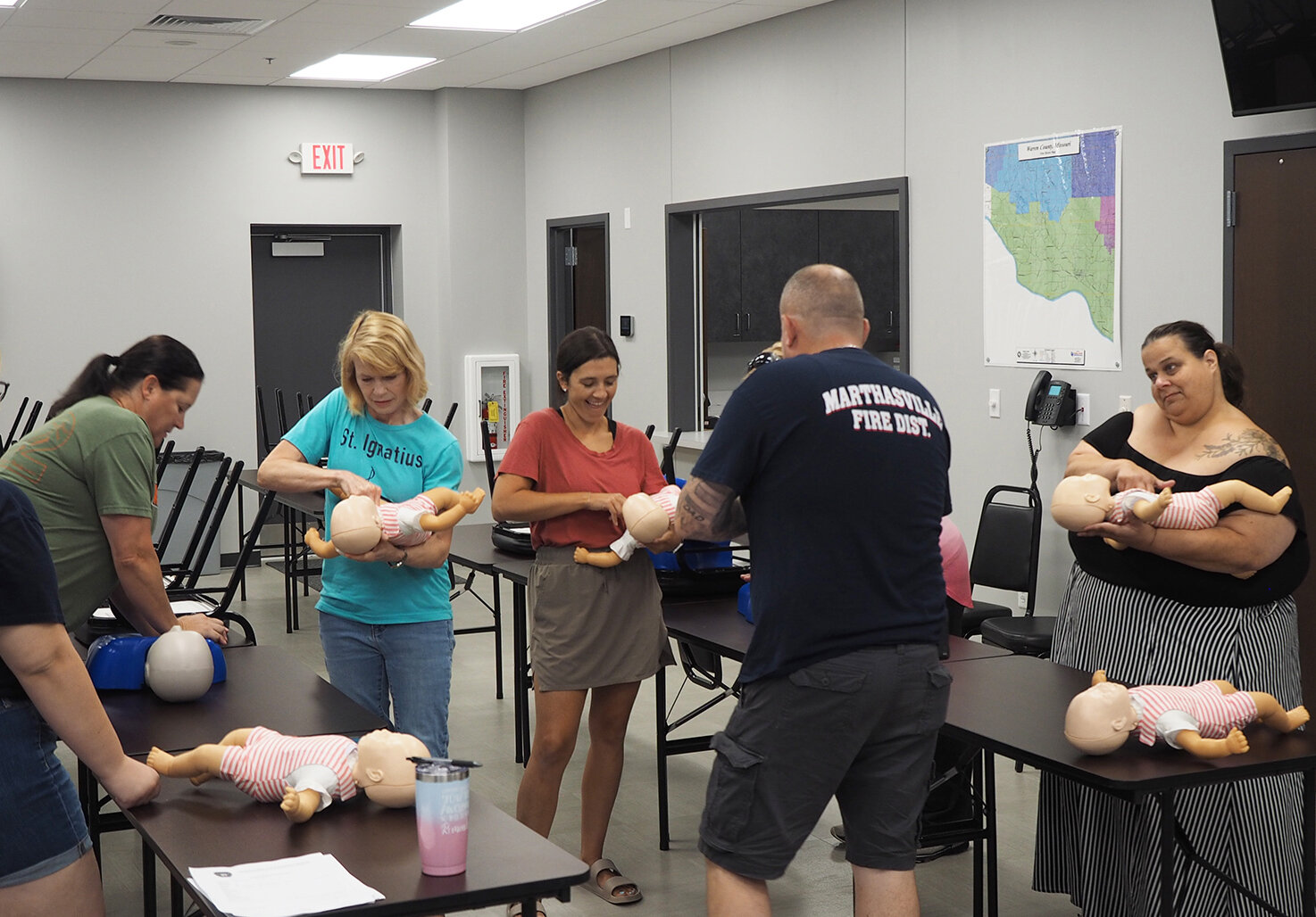 HANDS-ON CPR — The Marthasville Fire Protection District invited area school staff to participate in its first Safety Rodeo Tuesday, Aug. 8. Nearly 50 teachers and staff were able to train in CPR, AED, Stop the Bleed, Choking, Medical Emergencies and fire extinguisher usage. MFPD volunteers conducted the training.