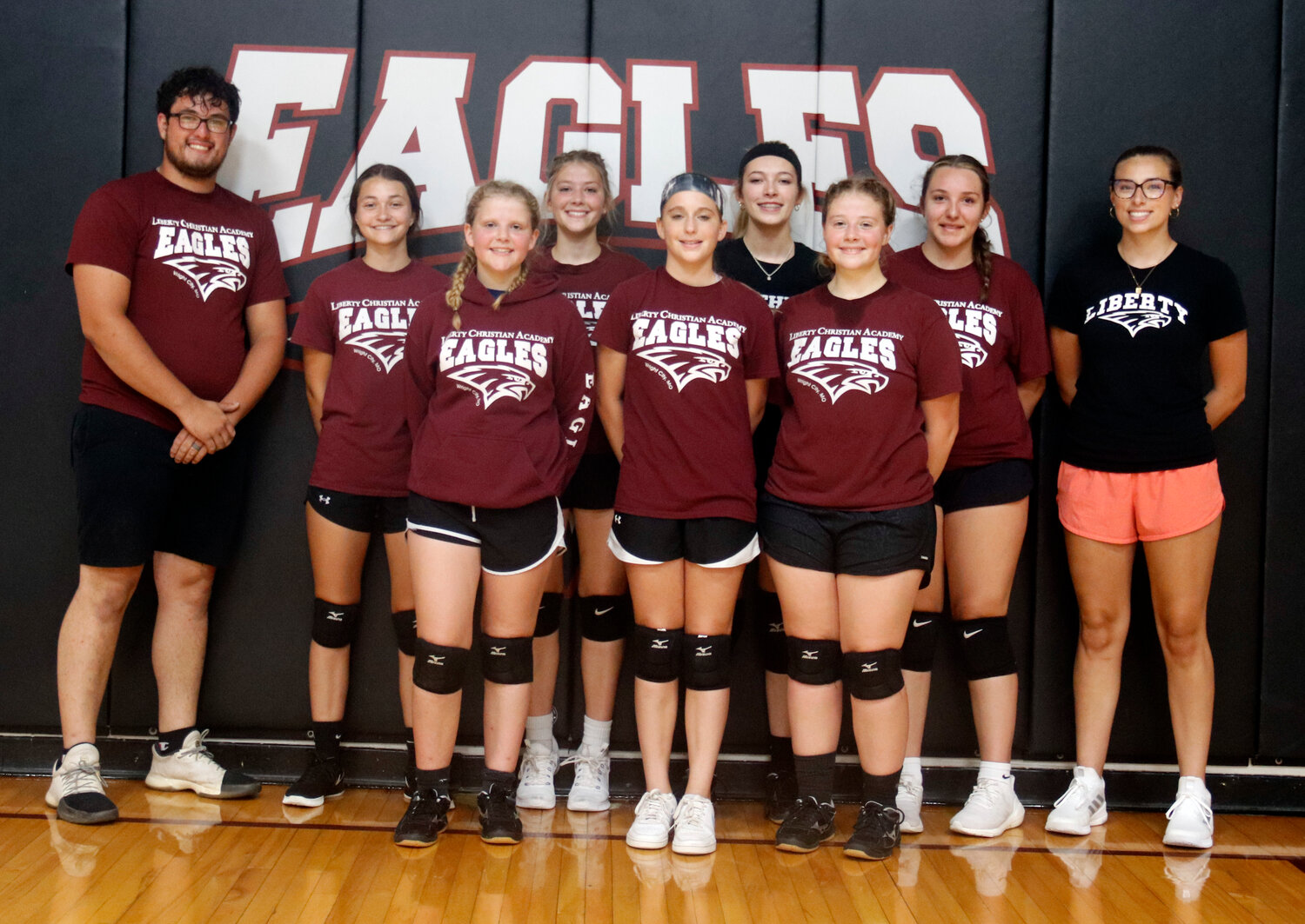 Members of the Liberty Christian Academy volleyball team are, front row, from left: Addi Scheltens, Emma Woodson, Trina Scheltens. Back row, from left: Head Coach Dakota Ball, Raelee Bruno, Andreanna Scheltens, Jubilee Nowlan, Caroline Keller, Assistant Coach Gracie Foran.