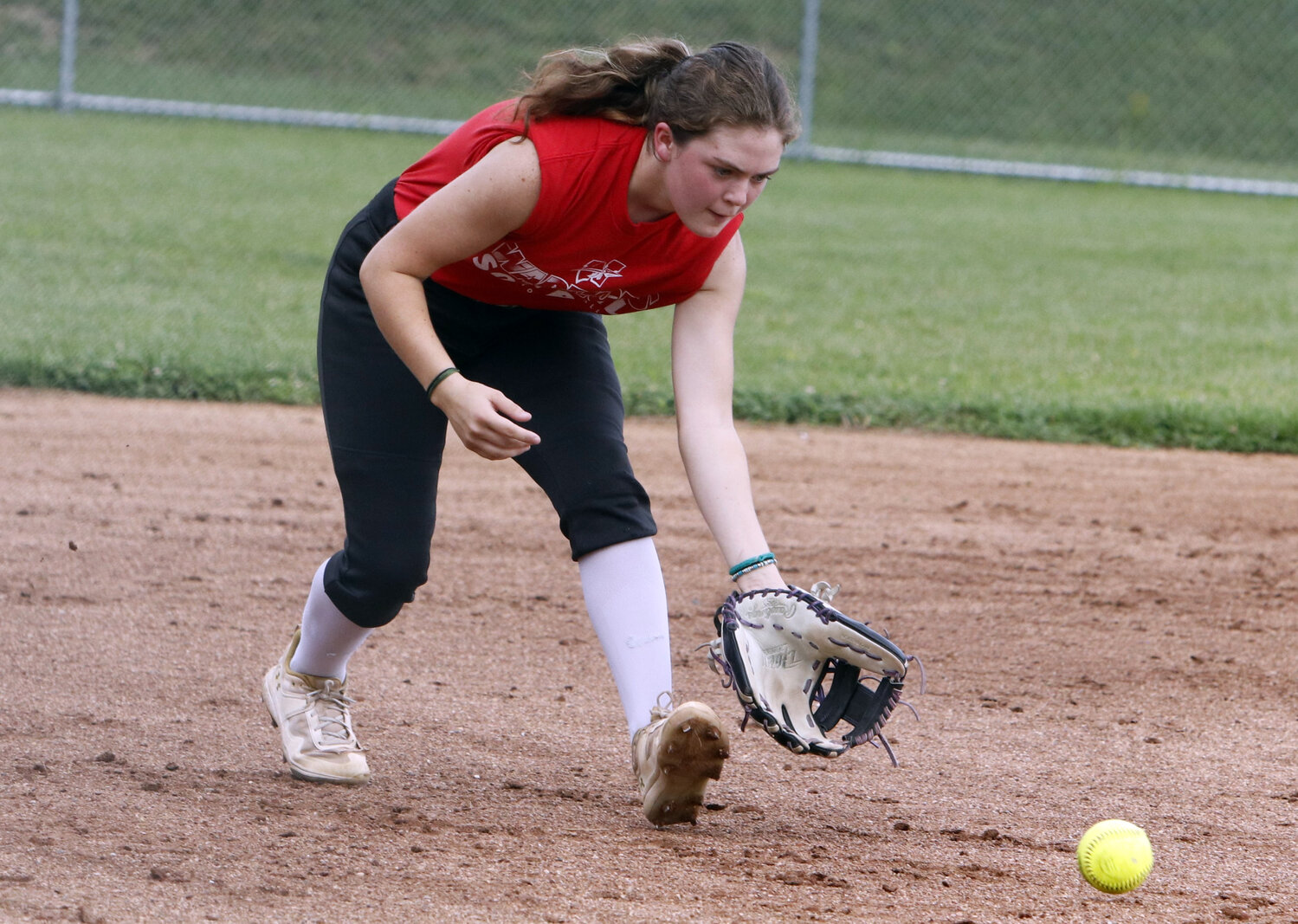 Paige Campbell fields a ground ball during infield drills at a practice earlier this month.