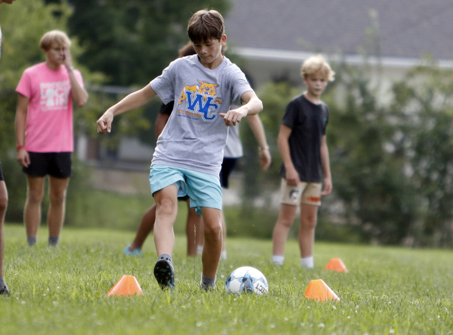 Thomas Wilgus dribbles the ball during a drill at practice earlier this month.