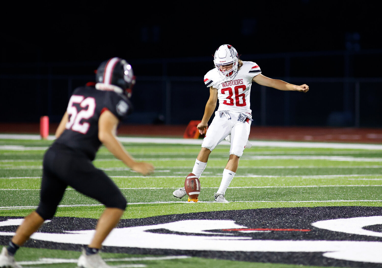 Warrenton's Tyler Faerber (36) kicks off during a game against Fort Zumwalt South, Friday, Aug. 25, 2023, at Fort Zumwalt South High School in St. Peters, Mo.