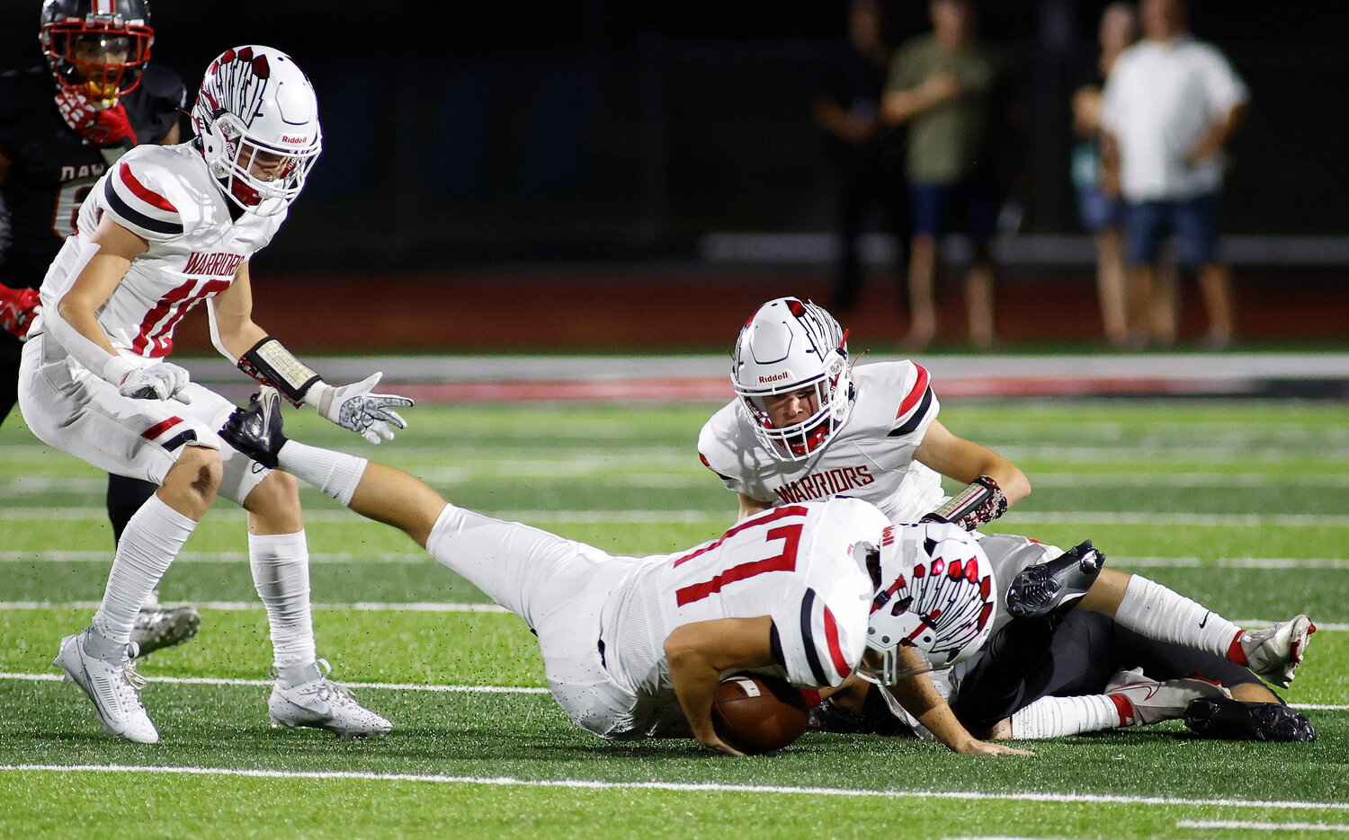 Warrenton's Brody Reel (17) dives for a loose ball during a game against Fort Zumwalt South, Friday, Aug. 25, 2023, at Fort Zumwalt South High School in St. Peters, Mo.