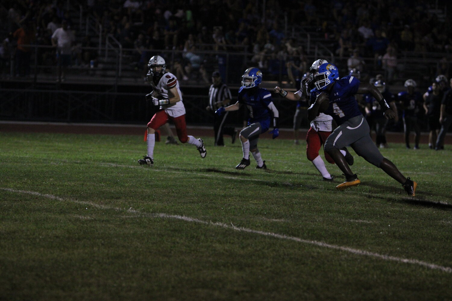 Carleon Jones runs the ball during the Wright City-Winfield game. He would take it in for a touchdown.