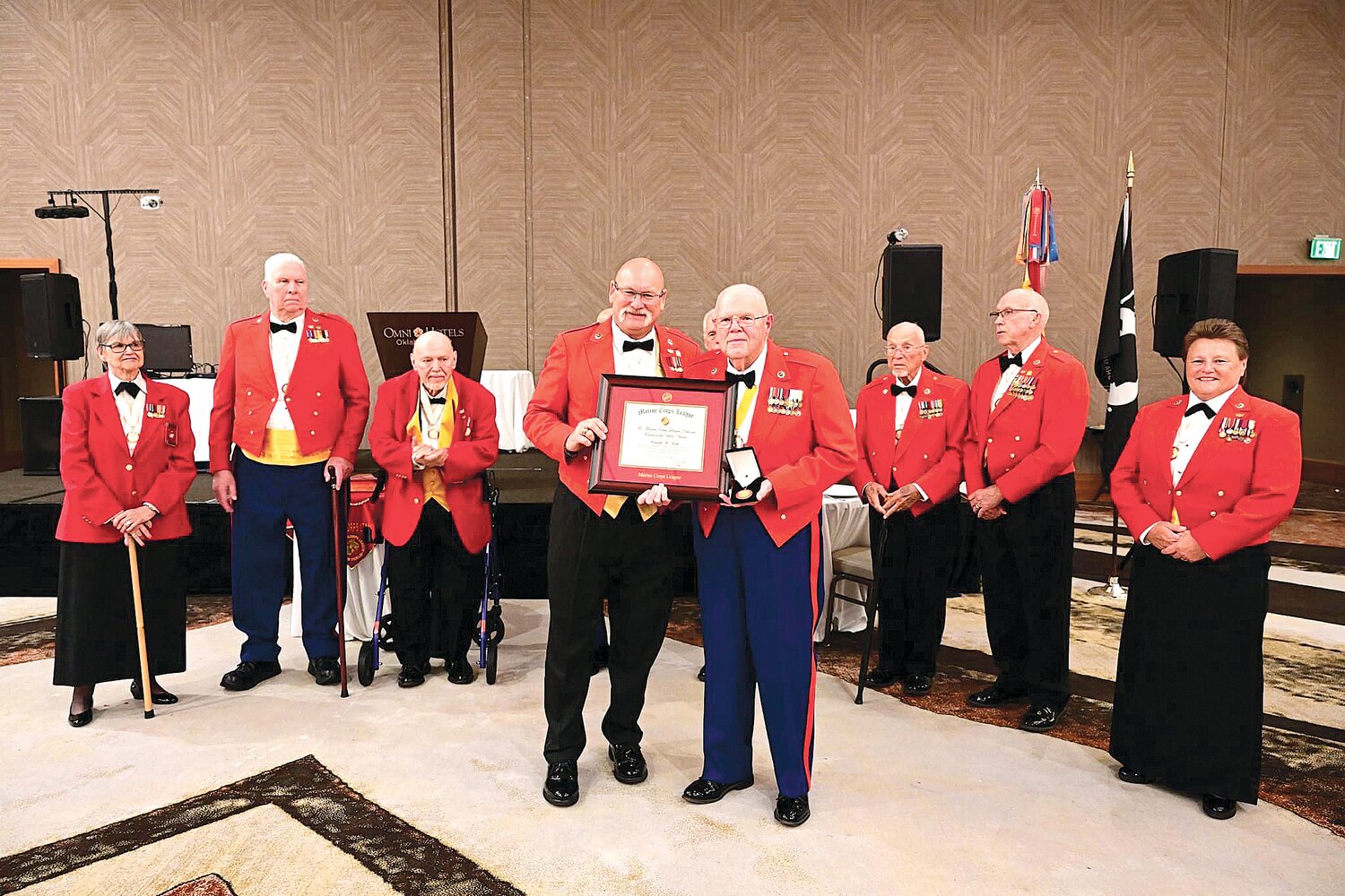 Jeffery Jones presents the Marine of the Year award to Wendell W. Webb, of Warrenton, during the Marine Corps League National Convention in Oklahoma City. They are flanked by previous recipients of the award.  Submitted photo