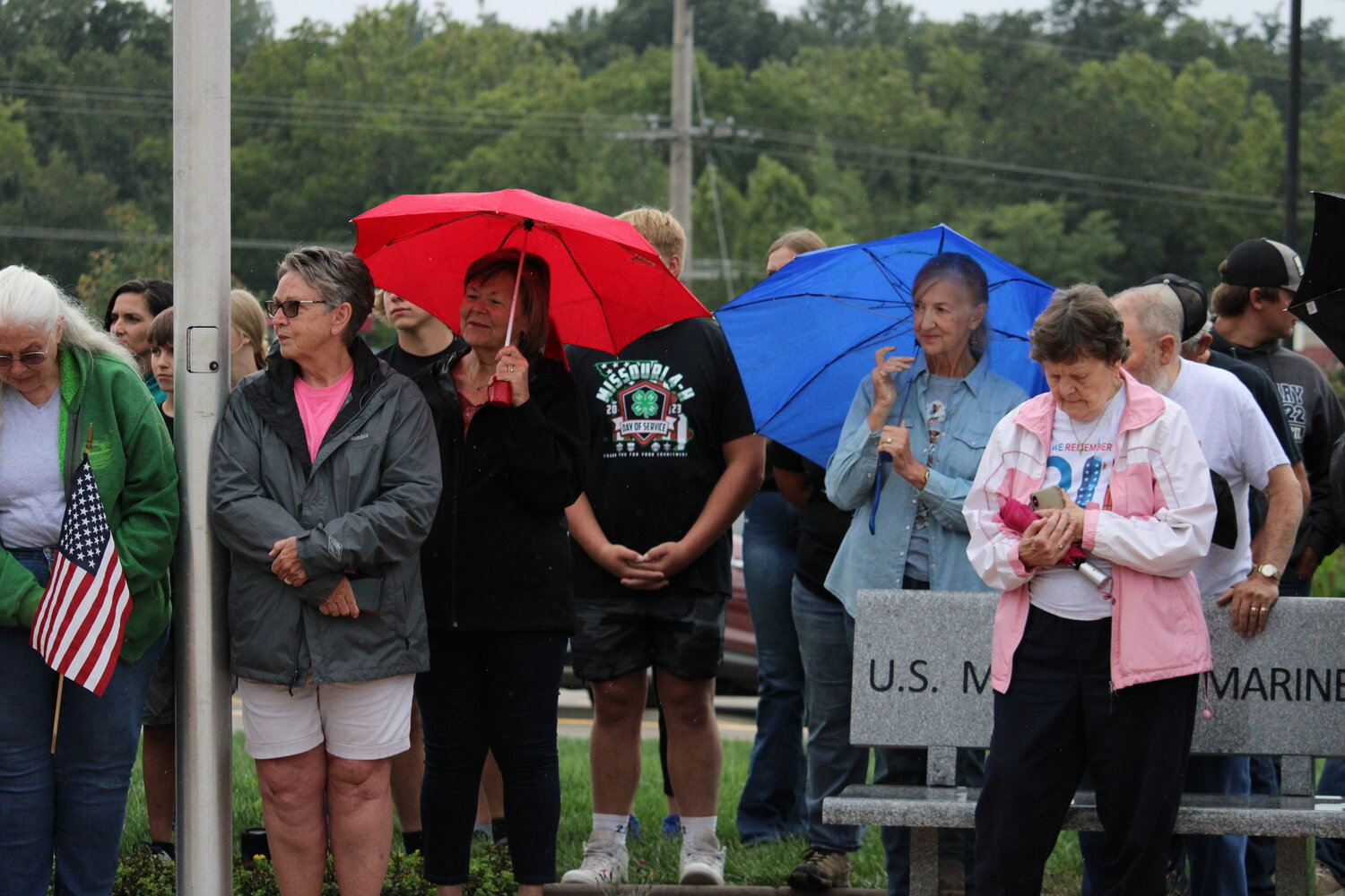 Members of the crowd listen to the speeches during the Sept. 11 ceremony.