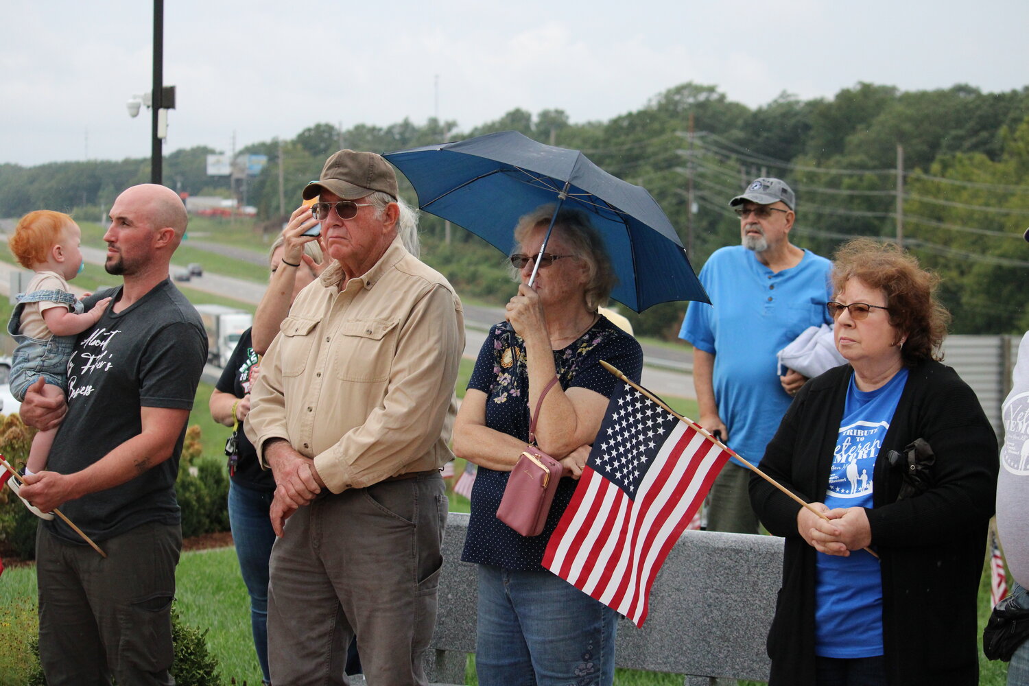 Members of the crowd listen during the Sept. 11 ceremony.
