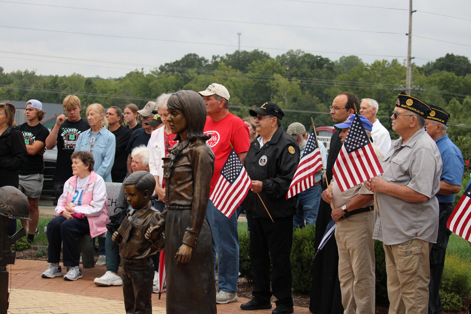 Members of the crowd listen during the Sept. 11 ceremony.