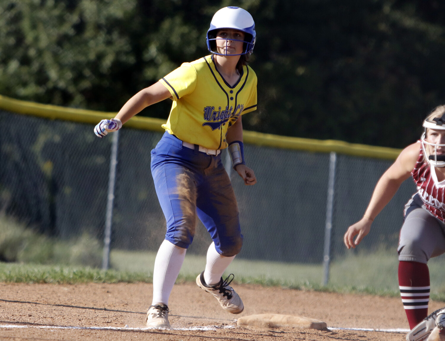 Ava Swaringen takes a lead off of third base during Wright City's game against Louisiana.