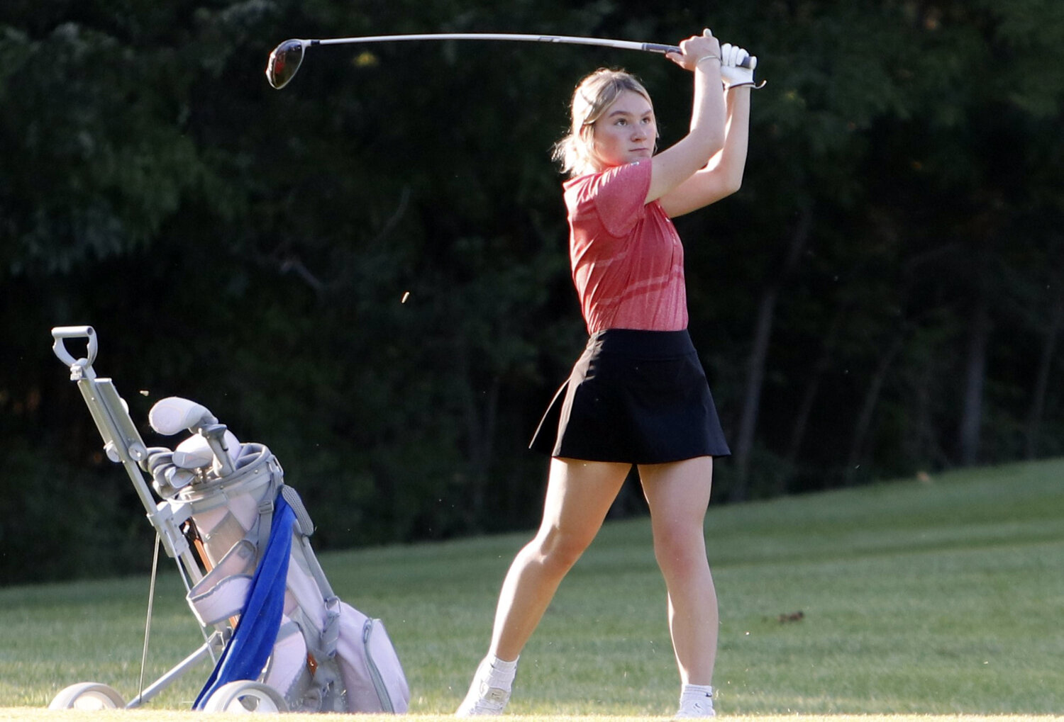Jenna Marschel watches after hitting a tee shot at the No. 6 hole at Innsbrook Golf Course.