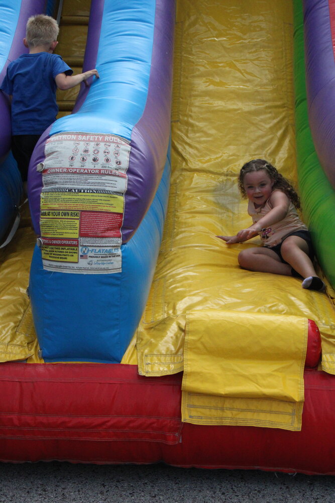She reached the end of the slide!