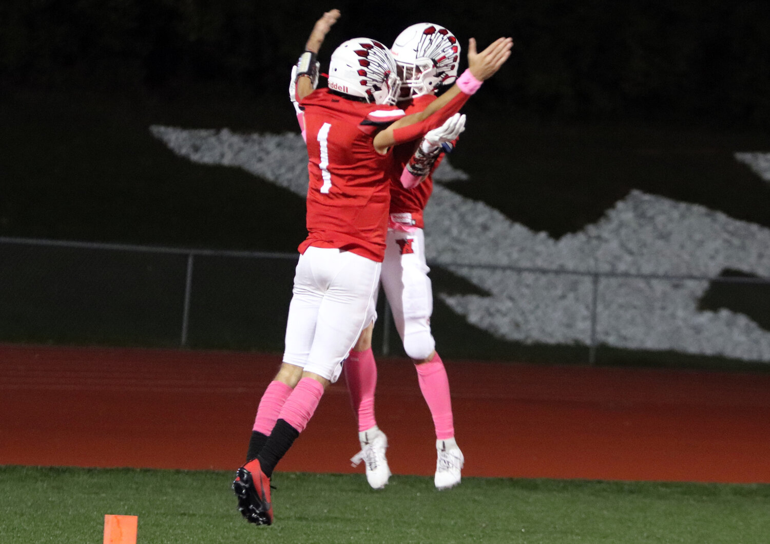 Charlie Blondin (left) celebrates with Mason Thompson after Blondin scored a touchdown.