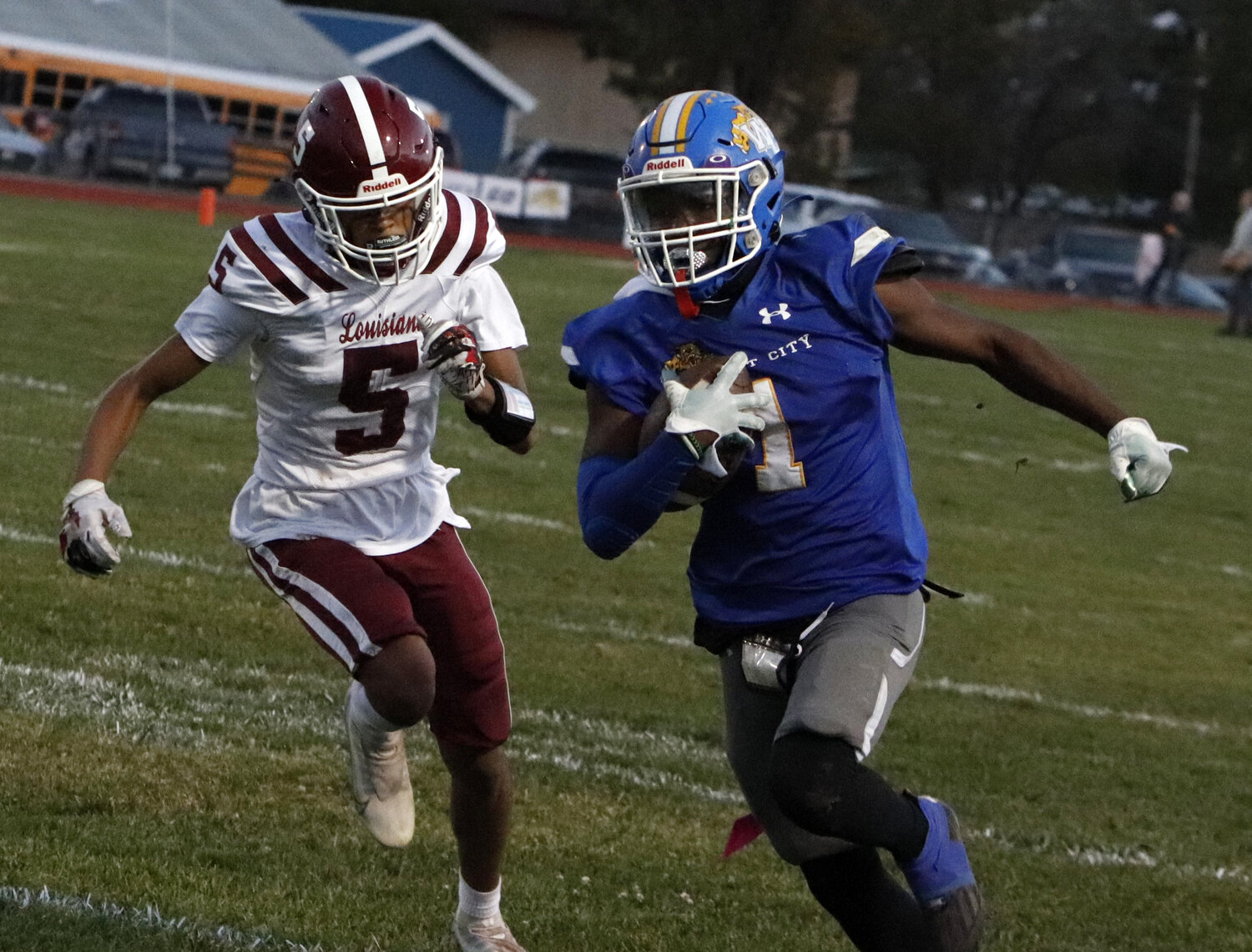 Kayden Allison (right) runs towards the end zone during one of this two touchdown receptions.