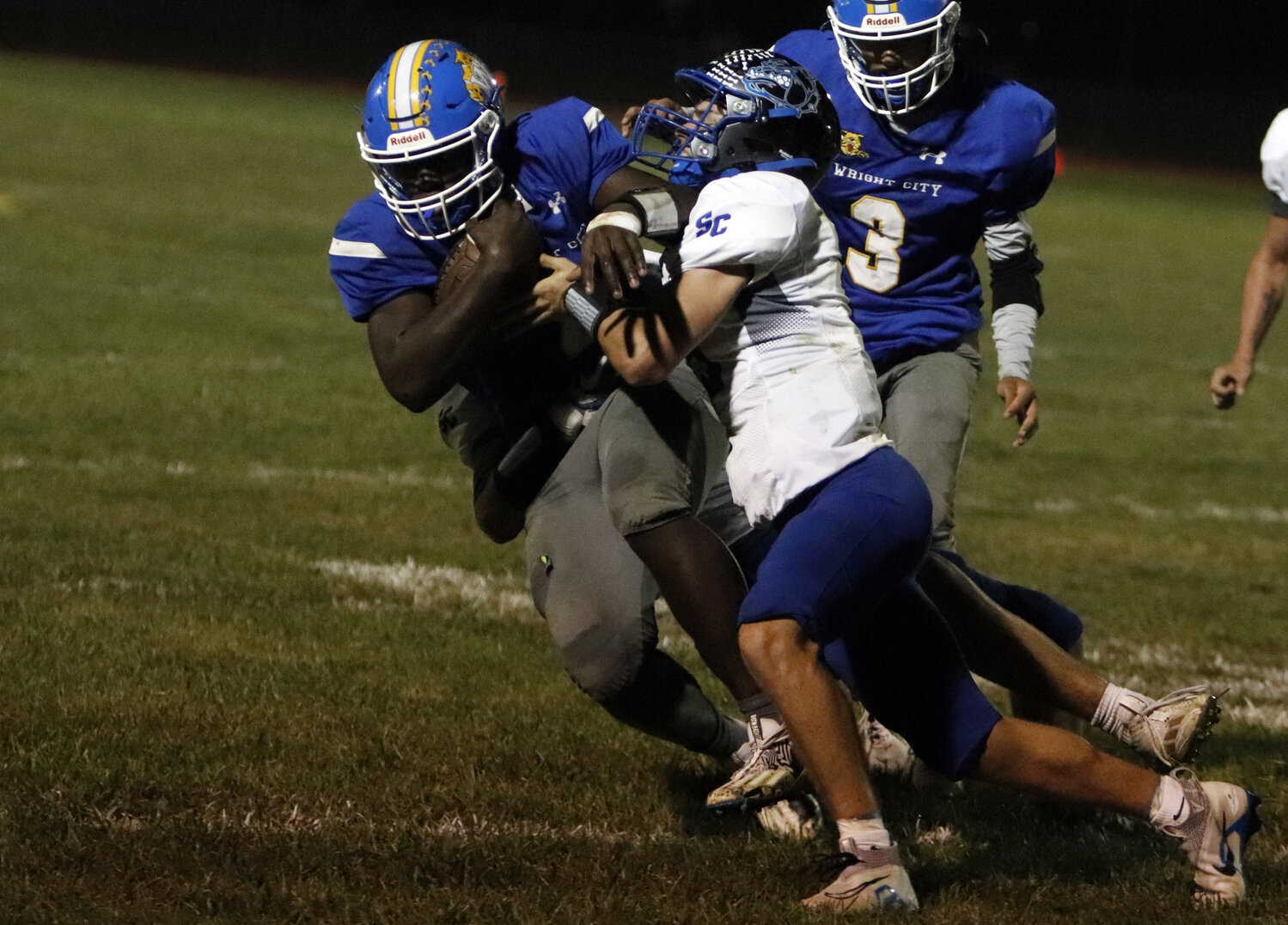 Carle'on Jones (left) fights through a tackle during a game against South Callaway earlier this season. Jones was named to the EMO first team as a linebacker.
