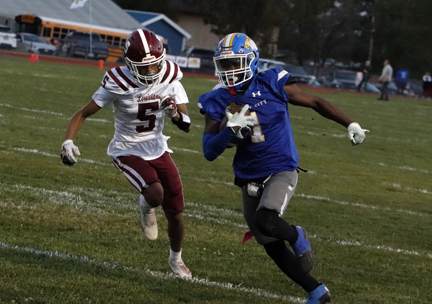 Kayden Allison (right) runs towards the end zone during a game against Louisiana this past season. Allison was named to the EMO first team at wide receiver.
