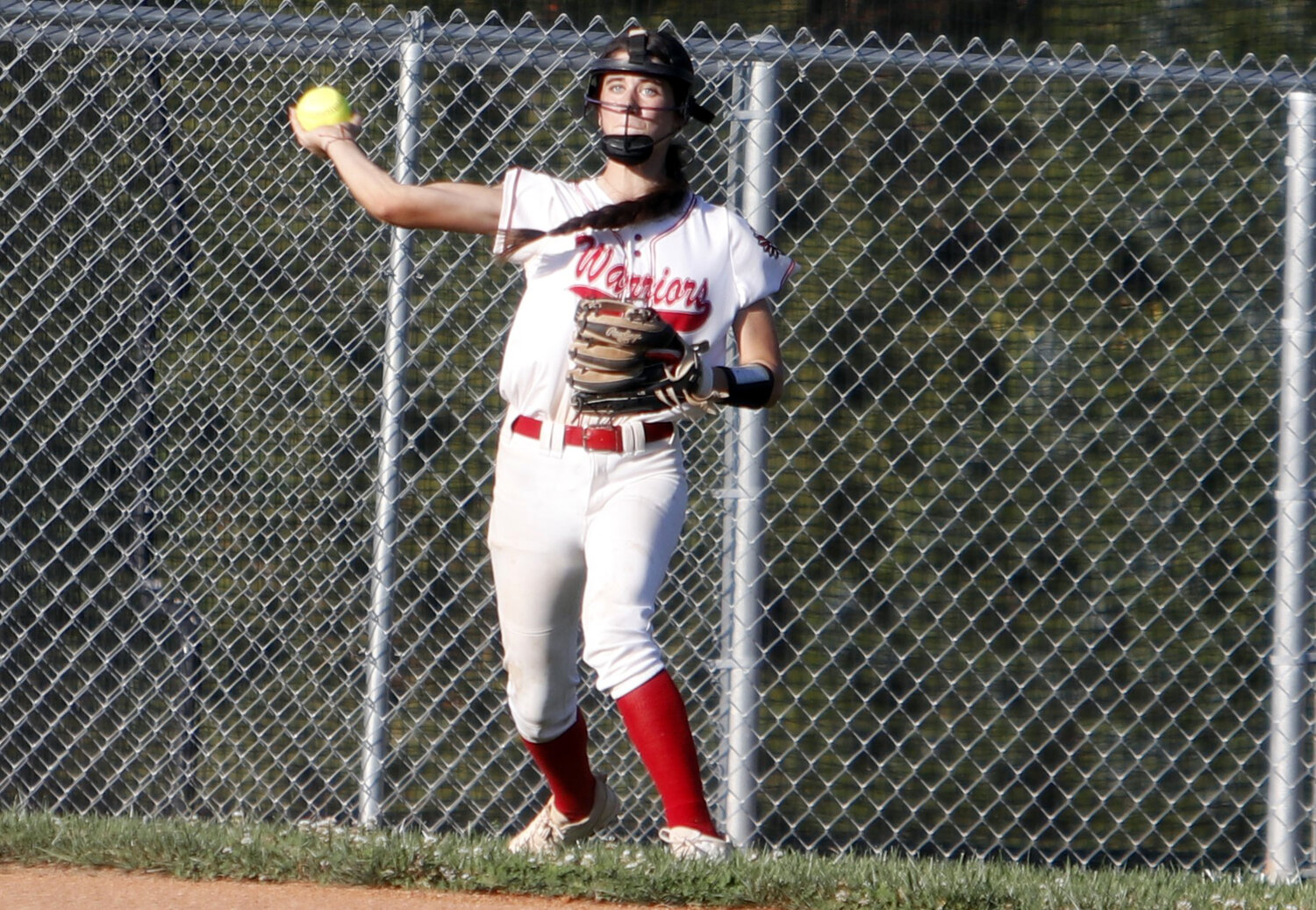 Kiera Daniel throws the ball to first base during a game against Montgomery County earlier this season.