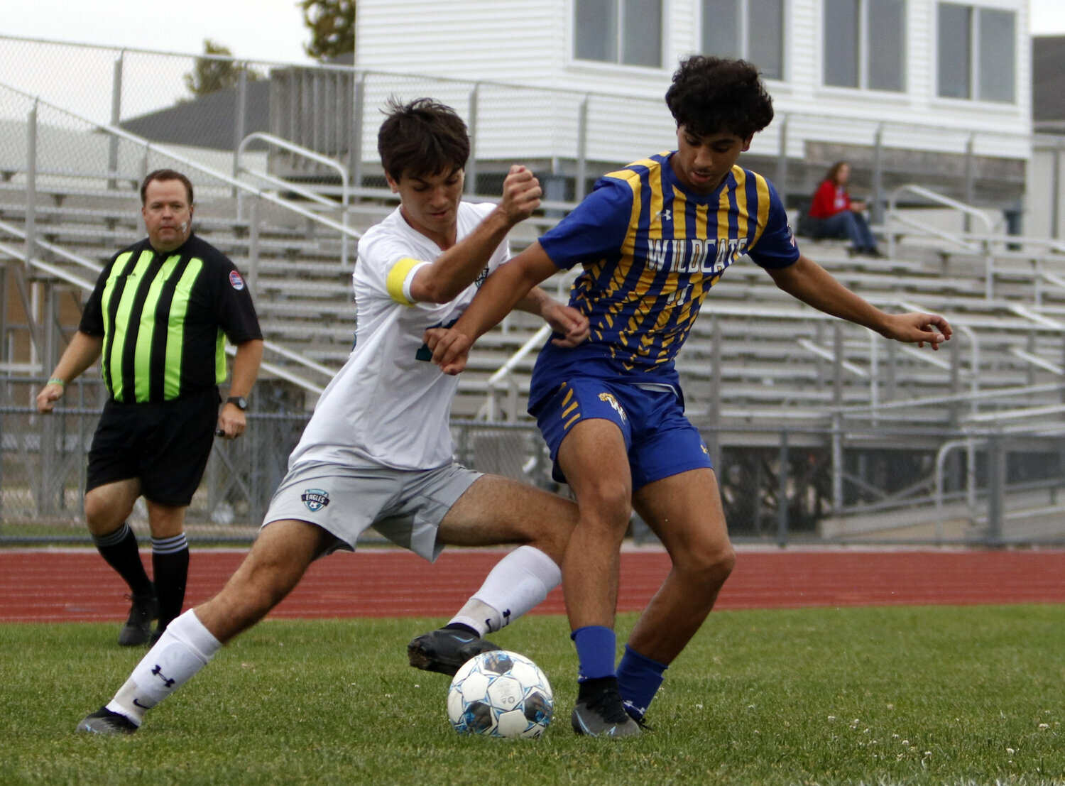 Laith Abualzulof (right) battles for possession of the ball during a game against Christian this past season.
