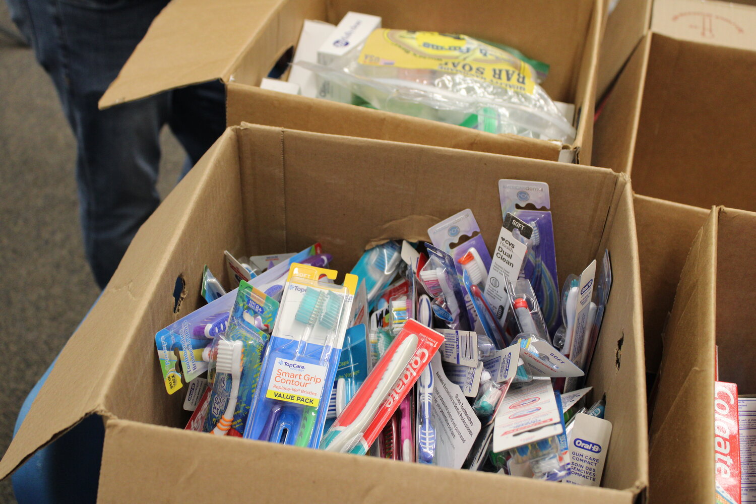 This detail shot shows several donated toothbrushes that will be given to homeless veterans.