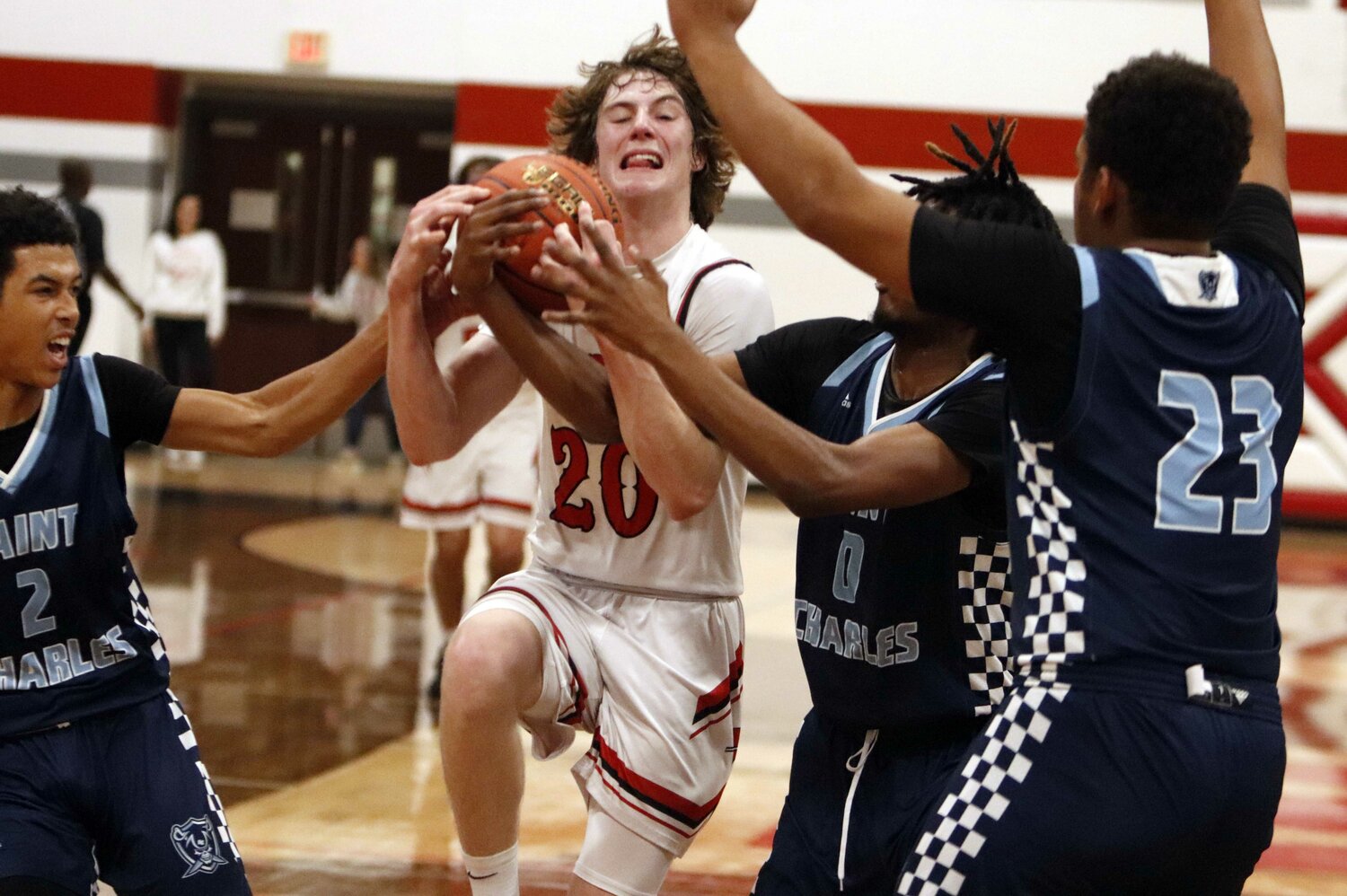 Warrenton senior Troy Anderson is fouled as he drives to the basket during the first half of Warrenton’s 75-55 loss to St. Charles. Anderson scored 24 points in Warrenton’s GAC North loss.