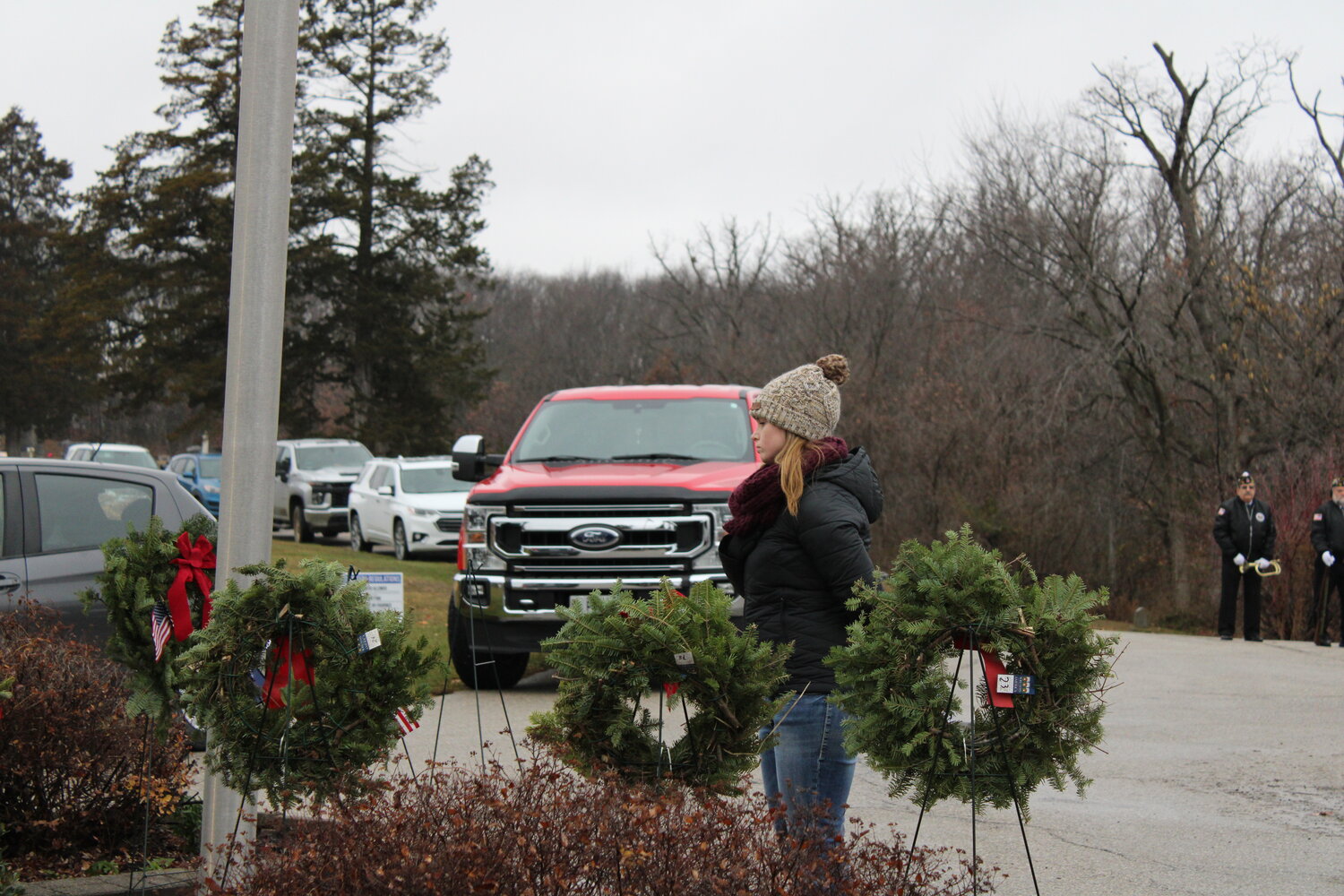 McKenna Jones honors the wreaths placed to recognize the branches of the U.S. military.