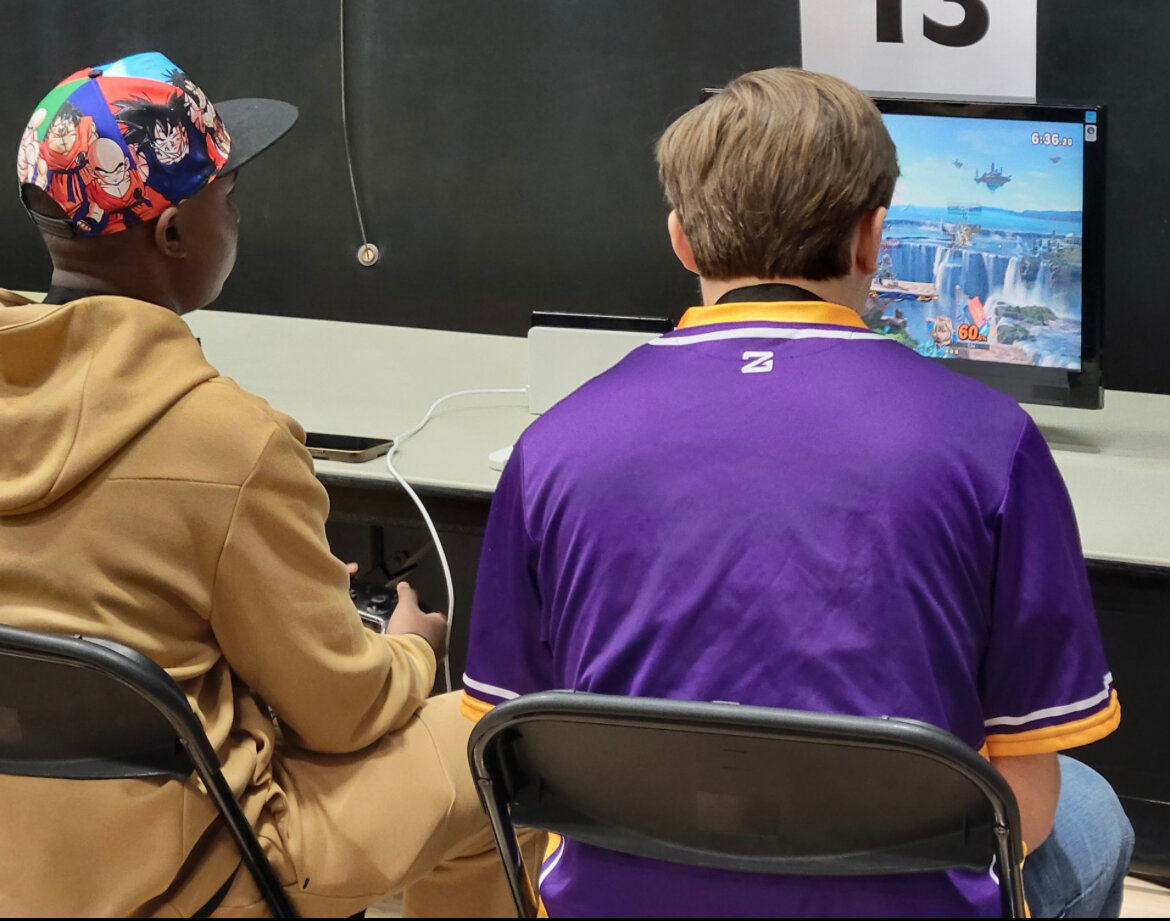 Tim Washington, left, competes in the first round of the state esports competition. Washington is the first student from Warrenton to ever place at the state competition, where he finished in ninth place.