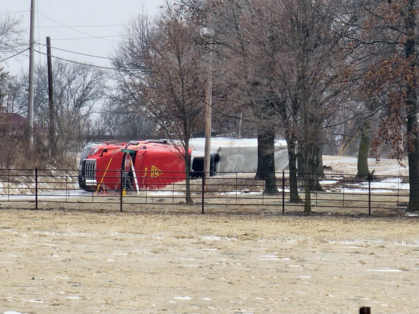 A semi truck is on its side on Highway M near Franklin Road the morning of Jan. 22 in Warren County.