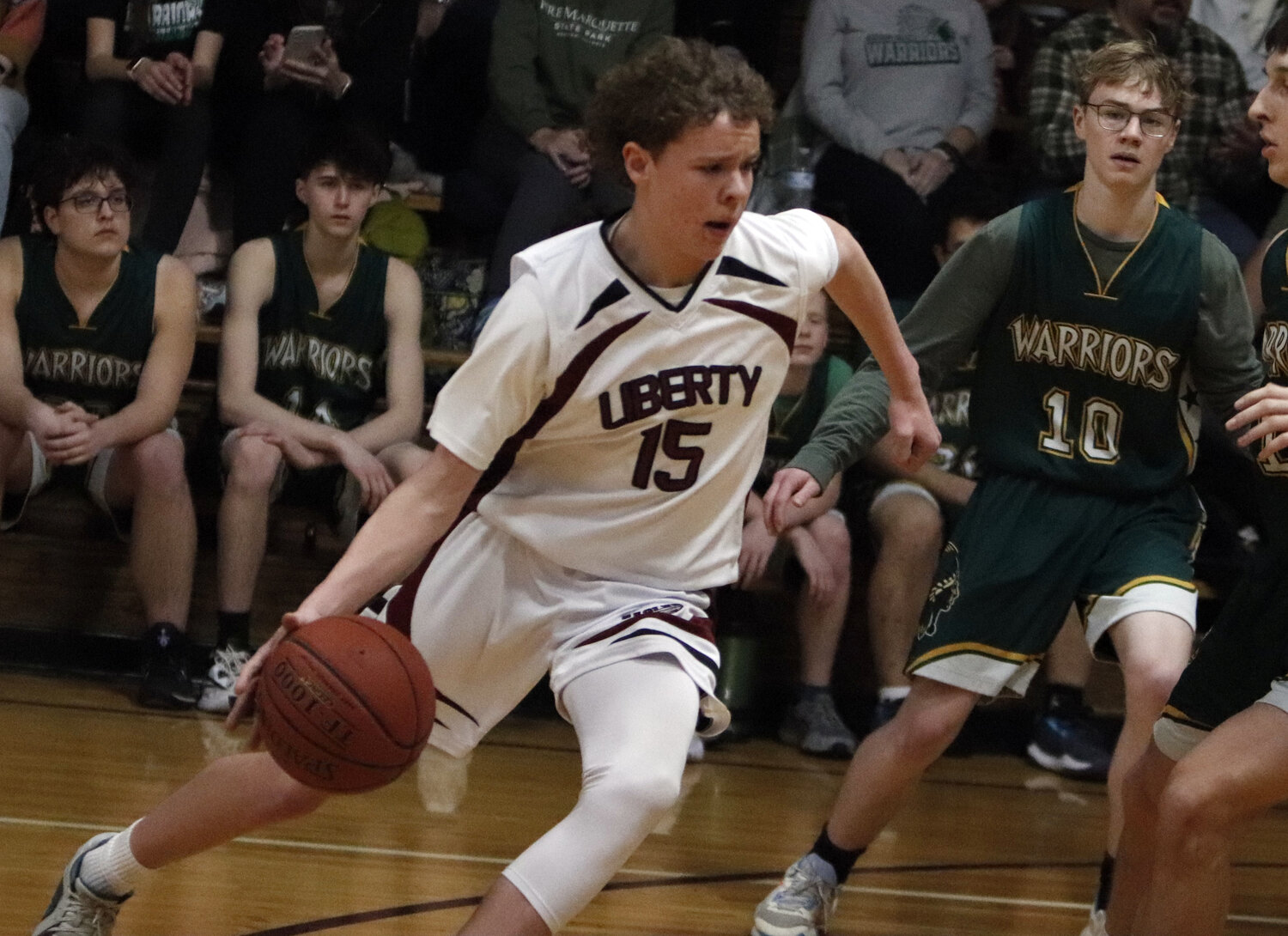 Brody Kuehn drives to the basket during the first half of last weekend's game.