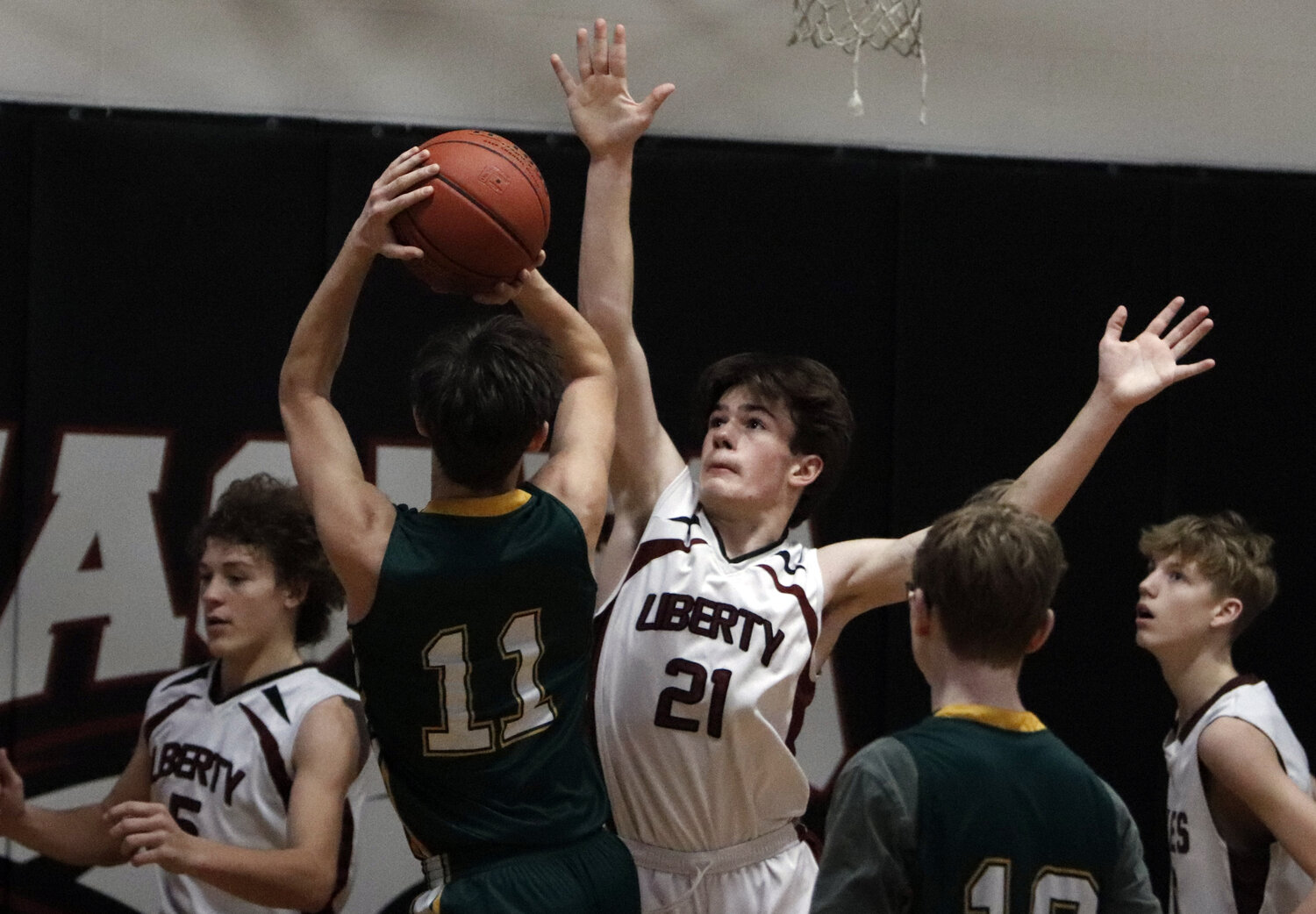 Jack Duvel attempts to block a shot during Liberty Christian's home game against Mississippi Valley Christian.