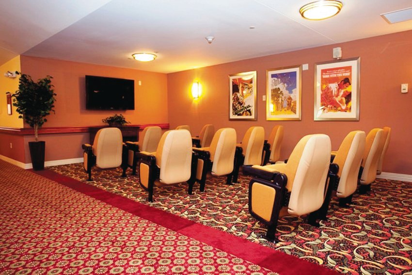 This state-of-the-art Memory Care Assisted Living Residence in Johnston provides compassionate care to those with Alzheimer’s Disease, dementia and other memory-loss conditions. Check out this theater, complete with comfy lounge chairs.