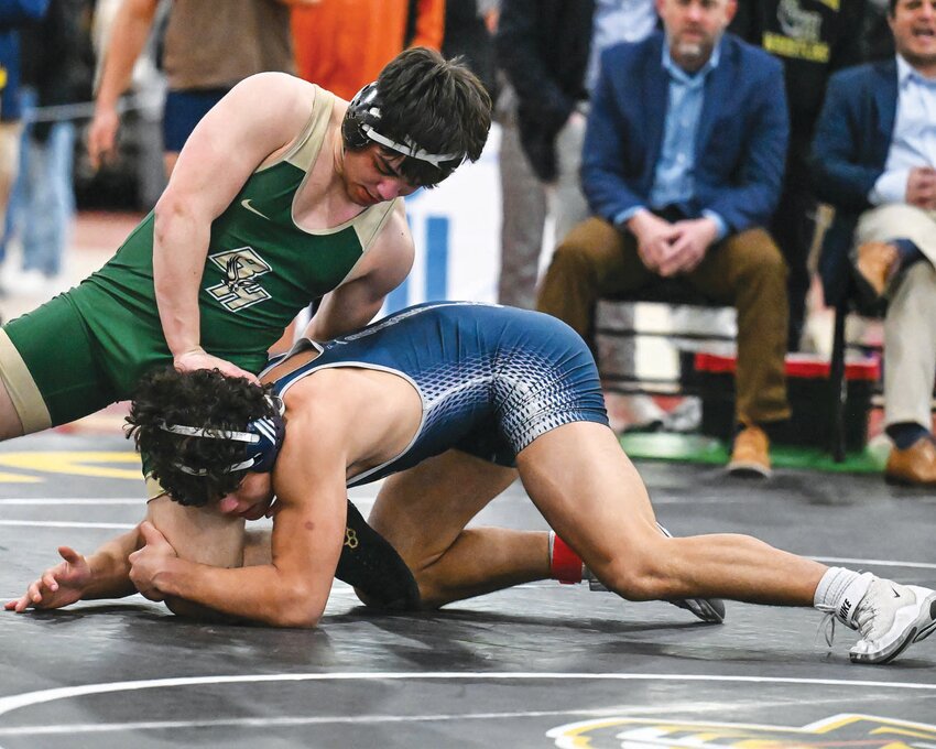 SPRAWL: Hendricken’s Lincoln Tiernan, who finished in fourth at 175 pounds.