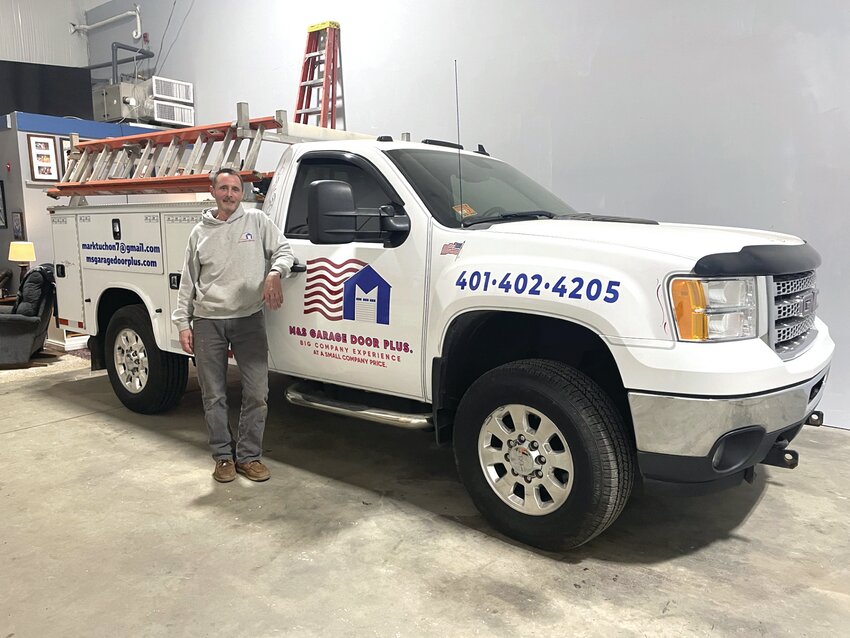 Meet Mark Tuchon, the owner of M & S Garage Door Plus, seen here with this signature truck, ready to help with ALL your commercial and residential garage door needs, and so much more!
