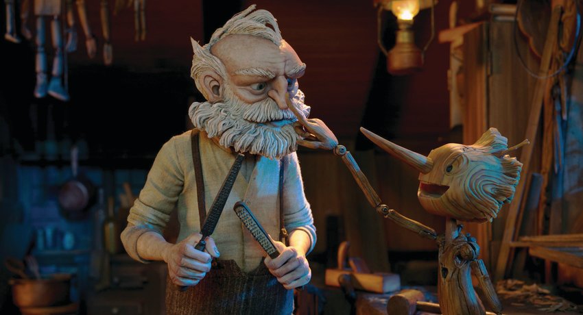 Gepetto (voiced by David Bradley) and Pinocchio (Gregory Mann) in "Guillermo del Toro's Pinocchio."
