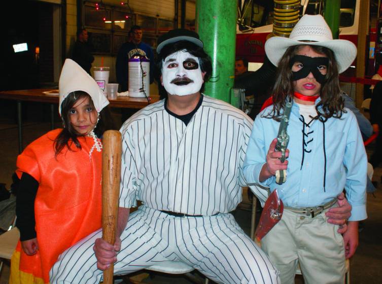 A FAMILY FRIGHT: The Kevorkian family arrived at the party with Bedros as candy corn, Allan Sr.  as &quot;Baseball Fury&quot; and Allan Jr. as the Lone Ranger.