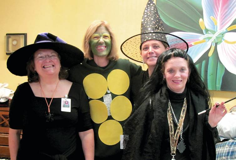 SETTING THE SPOOKY EXAMPLE: Pictured here, the Manor&rsquo;s activities staff shows off their costumes. They are, from left: Patricia Odette, Penny Riddensdale, Maureen Urban and Diane Ferri.