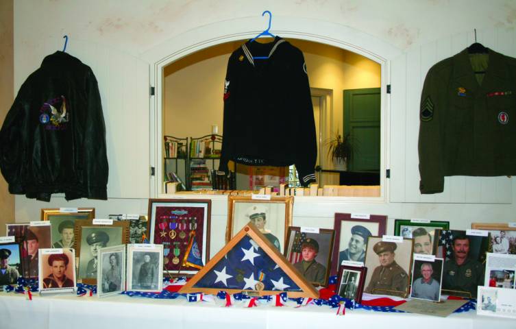 PATRIOTIC DISPLAY: The staff at the Villa worked with residents to put together a display of photographs, medals and memorabilia from the facility&rsquo;s veteran community.