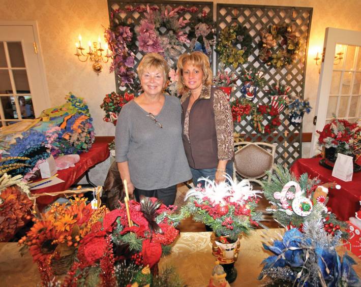 TAKE A BOW: Lori and Linda of Lori's Petals and Bows displayed their creations at the event.