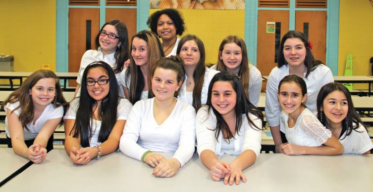JUST THE GIRLS: The girls from the Ferri Middle School chorus get excited before the show.
