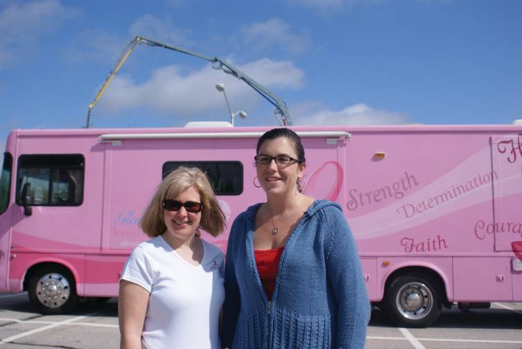 BRINGING HOPE: Alison Croke and Tracy Baran, co-chairs of the Touch A Truck event, check out the Gloria Gemma Breast Cancer Resource Foundation&rsquo;s Hope Bus.