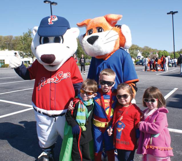 JACK&rsquo;S SUPERHEROES: Dressed as Superman, Jack Mayer, a cancer survivor, is surrounded by his friends at the Tomorrow Fund Stroll this past Sunday in Garden City. Pictured with Jack are Jake Dickstein, Kate Mayer, Hannah Dickstein, along with &ldquo;Paws&rdquo; from the Pawtucket Red Sox and &ldquo;Jake&rdquo; from 98.1 Cat Country.