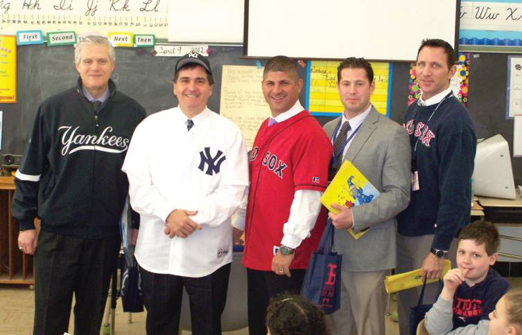 3  @C_Cutline:SPORTS STORIES: Superintendent Peter Nero and School Committee member Frank Lombardi teamed up for Reading Week, coordinating their Yankees gear, in opposition with the middle school principals, who are all Red Sox fans.
